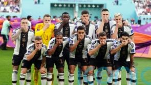 Germany players cover mouths for team photo in protest over OneLove armband ban