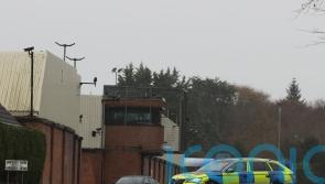 Man arrested after explosive device left outside police station