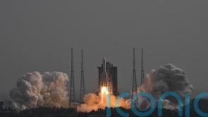 China launches three astronauts to complete space station