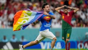 Man who invaded pitch with rainbow flag banned from World Cup matches
