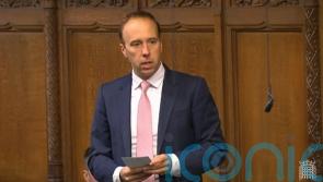 Hancock jokes he is pleased to be ‘clean and well-fed’ on return to Parliament