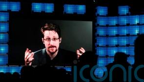 Whistleblower Snowden receives Russian passport as he takes citizenship oath