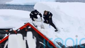 Sailors dig out world’s most remote post office in Antarctic