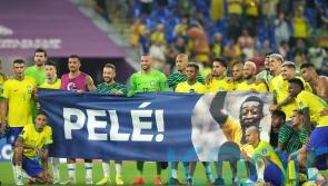 Brazil players display banner in support of Pele after seeing off South Korea