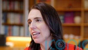 New Zealand’s leader says China has become ‘more assertive’