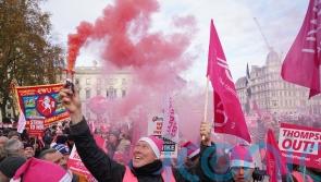 Thousands of striking Royal Mail workers stage rally near Parliament