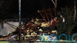 Emergency workers search through night as dozen missing in Jersey flat explosion