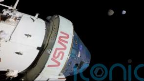 Nasa’s Orion capsule splash-lands in ‘textbook’ return to Earth from the Moon