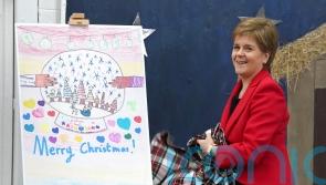 Nicola Sturgeon unveils her official Christmas card designed by school pupil