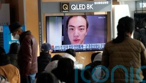 BTS member Jin begins military duty at frontline boot camp