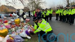 Tearful police pay silent tribute to boys who died in ice-covered lake tragedy