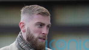 Assault charge footballer tells court he hopped over fan to protect injured foot