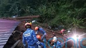 Dozens feared buried alive after landslide hits campsite north of Kuala Lumpur