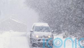 Amber weather warning in force as snow brings travel disruption