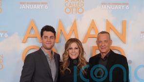 Tom Hanks supported by family while promoting latest film in London