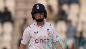 Ollie Pope hits half-century as Pakistan spinners keep England in check