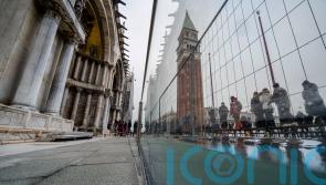 Glass barriers help protect Venice’s famous basilica from high tides