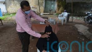 India to randomly test international visitors for Covid-19