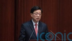 China’s prime minister praises Hong Kong leader for reviving economy