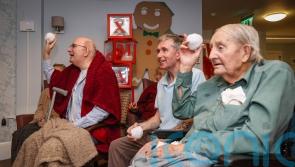 Indoor snowball fight at care home enjoying first restriction-free Christmas