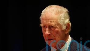 Man charged over comments made during proclamation ceremony for King
