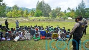 58 Rohingya Muslims land on beach in Indonesia’s Aceh