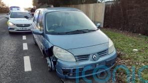 Man stopped by police after being caught driving car with missing wheel