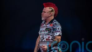 Reigning PDC world champion Peter Wright knocked out by Kim Huybrechts