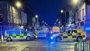 Three people and dog reported dead in early-morning hotel blaze