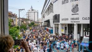 Fans mourn Pele at public viewing in Brazil stadium