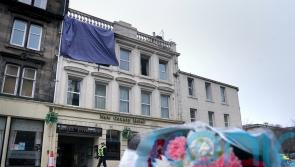 Investigations continue after three killed in hotel blaze