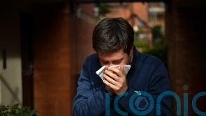 Unwell Scots urged to stay away from work to protect NHS