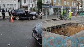 Sinkhole closes road in Teddington
