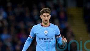 John Stones fires title warning to Arsenal after Man City cut gap to five points