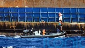 Warship rescues crew of sinking tug in the Caribbean