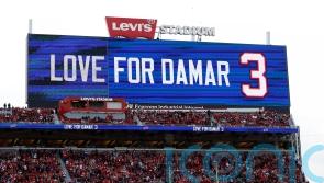 Damar Hamlin remains in hospital but ‘is in good spirits’ after cardiac arrest