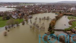 Flood warnings issued as heavy rain and 60 mph wind expected in parts of UK