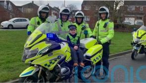 Boy, five, whose father died last year leads police on unique motorcycle ride
