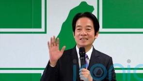 New head of Taiwan ruling party vows to safeguard democracy