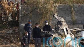 Relatives of Nepal plane crash victims protest at post-mortem delays