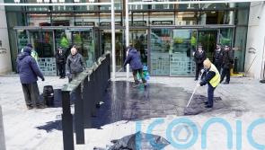 Extinction Rebellion throw black paint over Michael Gove’s office