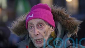 Poet Michael Rosen marches with nurses out of ‘gratitude’ after his Covid coma