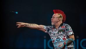 Peter Wright holds off Gerwyn Price to claim Nordic Masters title