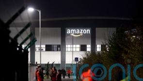 Amazon workers walk out in UK first for company&rsquo;s staff in pay dispute