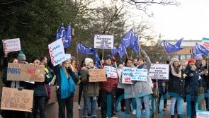 NHS physiotherapists say staff are ‘beyond breaking point’ in historic strike
