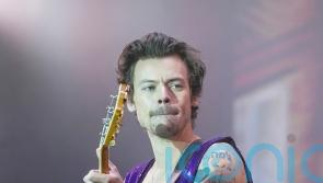 Harry Styles apologises to Los Angeles audience after ripping trousers onstage