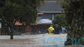Record rainfall in New Zealand’s largest city leaves at least three dead