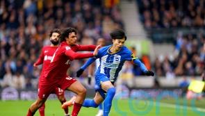Kaoru Mitoma’s last-gasp strike sends holders Liverpool out of FA Cup