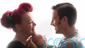 Couple rushed forward their wedding to give baby boy with brain tumour the family name before he died in their arms