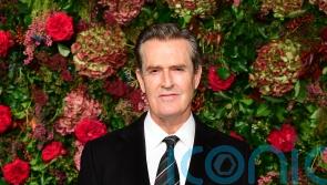 Rupert Everett claims he knows identity of woman Harry lost his virginity to
